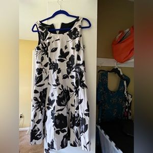 Black and creme  floral A line dress says size 8 but closer to a 6
